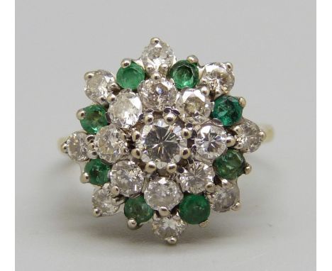 An 18ct gold, diamond and emerald cluster ring, approximately 1.15ct diamond weight, 4.6g, M 