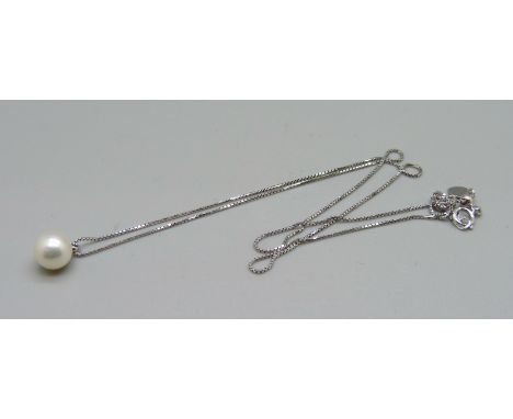 An 18ct white gold, pearl and diamond pendant and chain, 2.5g 