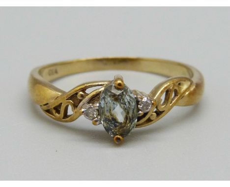 A 9ct gold ring set with a blue stone and diamonds, 2.4g, R 