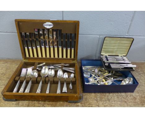 A canteen of community plate cutlery, a cased set of silver handled knives, other plated flatware including a large ladle and