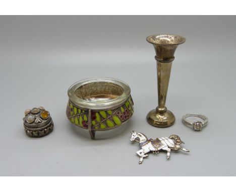 A silver and enamelled horse brooch, a/f, a white metal and enamelled salt, a small silver posy vase, a ring and a pill box 