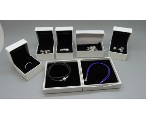 A collection of Pandora jewellery, a chain, two bracelets, a ring and nine charms 