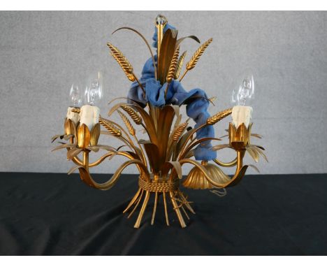 A 20th century gilt metal wheatsheaf chandelier, with five scrolling branches. H.49 W.55cm 