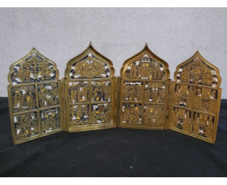 19th century Russian Orthodox brass and enamel three fold travelling icon depicting various stages of Christ's life, H.17.5 W