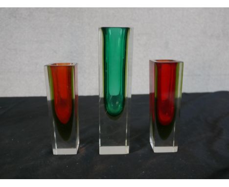 Three Murano sommerso glass vases of cuboid form, two with ruby glass centres, the largest with a green centre. H.20 W.5 D.5c