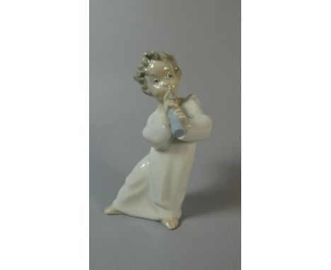 A Lladro Study of an Angel Playing Musical Instrument, 16cm high 