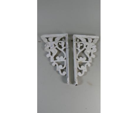 A Pair of Pierced Cast Metal Shelf Brackets with Cherub Decoration, Each 28cm High 