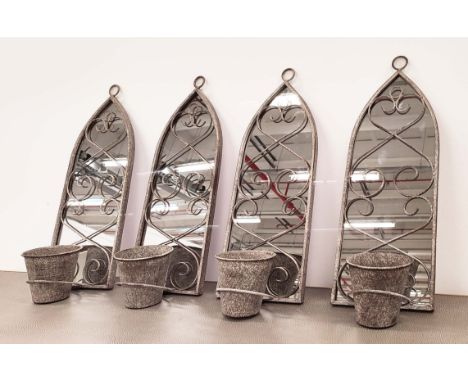 ARCHITECTURAL GARDEN MIRRORS, a set of four, metal arched frames with plant pot holders, 58cm H x 28cm W. (4)
