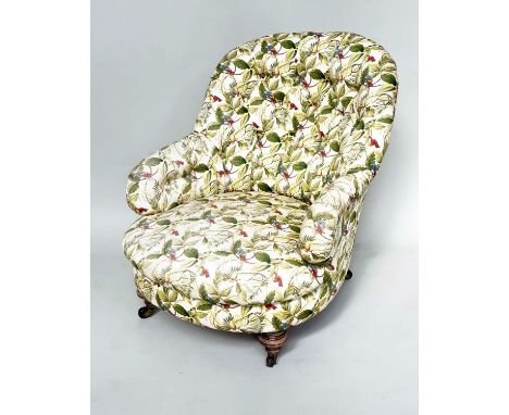 ARMCHAIR, Victorian with deep buttoned botanical print upholstery and turned front supports.