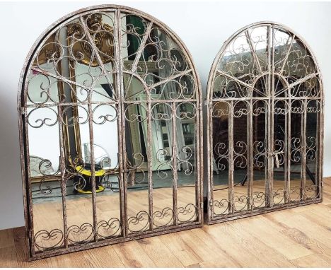 ARCHITECTURAL MIRRORS, a pair, gated metal frames in a distressed finish, 90cm H x 69cm W. (2)