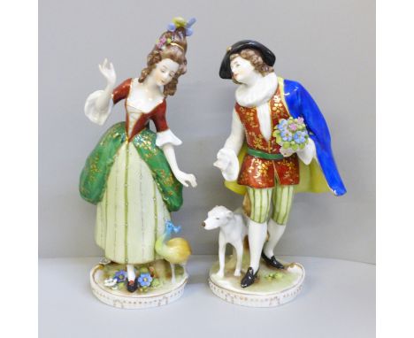 Two Sitzendorf porcelain figures, lady with peacock and gentleman with dog, 19.5cm 