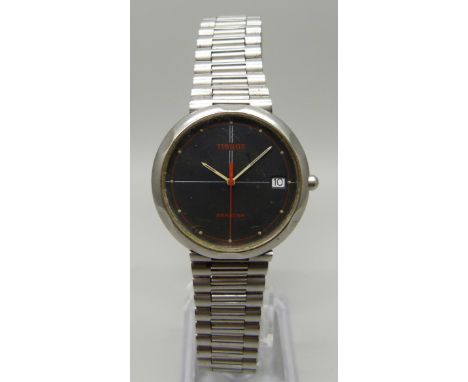 A vintage Tissot Seastar wristwatch with black face and red second sweep hand, with date and original strap 