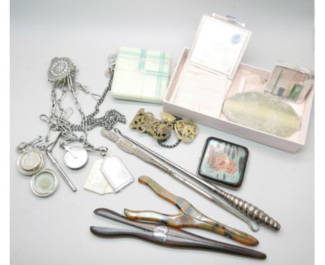 A collection of compacts, a butterfly wing compact Gwenda, a Chantelaine, glove stretchers, button hooks, etc. 