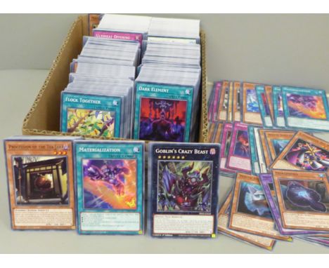 A large quantity of Yu-Gi-Oh cards, over 1000 including first editions 