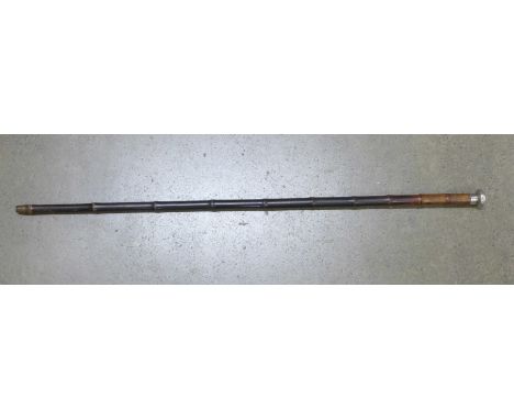 A circa 1900 bamboo sword stick with white metal top 