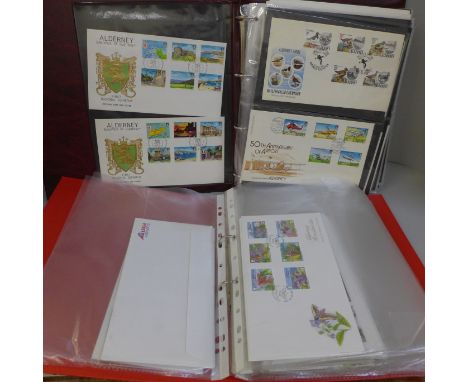 Two albums of first day cover stamps, mainly Alderney 