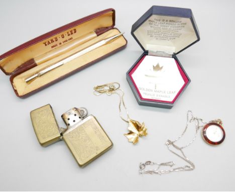 A rolled gold Yard-O-Led pencil, a silver gilt chain with 'Golden Maple Leaf' pendant, a Zippo lighter and a Bemar pendant wa