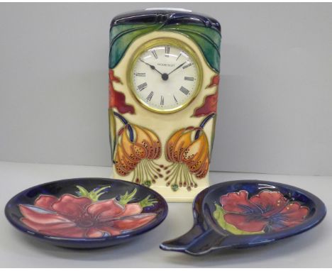 A Moorcroft Anna Lily mantel clock and two Anemone pin dishes 