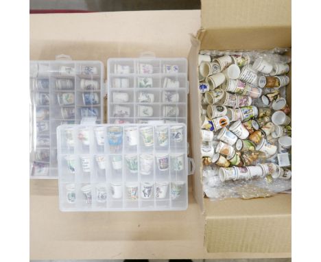 A collection of approximately  150+ ceramic thimbles **PLEASE NOTE THIS LOT IS NOT ELIGIBLE FOR IN-HOUSE POSTING AND PACKING*