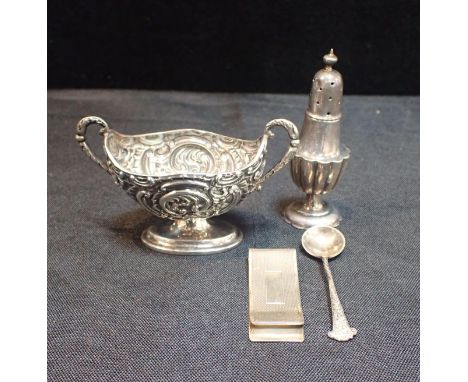A SILVER MONEY CLIP, WILLIAM MANTONBirmingham, 1991, engine turned, with vacant cartouche and oversized hallmarks, a small si