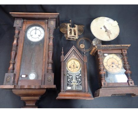 AN AMERICAN ANSONIA 'STEEPLE' CLOCKstriking on a gong, 40cm high (running, but not tested at length), a Vienna style wall clo