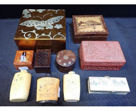 A COLLECTION OF BONE SNUFF BOTTLES WITH EROTIC SCENESand a similar box (modern), a cinnabar lacquer box, a box inlaid with a 
