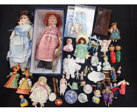 A COLLECTION OF DOLLS AND OTHER ITEMSincluding a Zwergnase 'Nelchen' doll, another similar modern doll, other smaller dolls, 