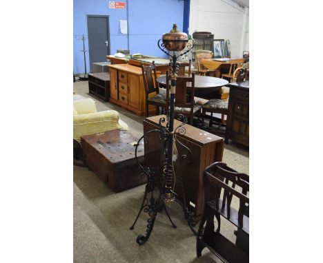 VICTORIAN IRON AND COPPER OIL LAMP STAND WITH LATER ELECTRICAL CONVERTION TOGETHER WITH A FURTHER IRON KETTLE STAND (2)