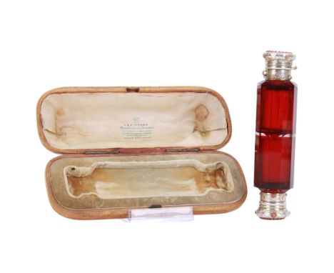 Victorian silver mounted ruby glass double ended scent bottle, of cylindrical faceted form, with screw threaded silver cover 
