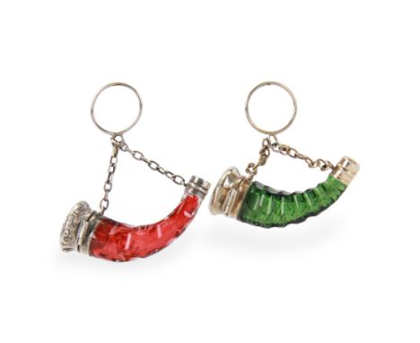 Two small Victorian silver mounted glass scent bottles or flasks, in the form of horns, the green and cranberry facet cut bod
