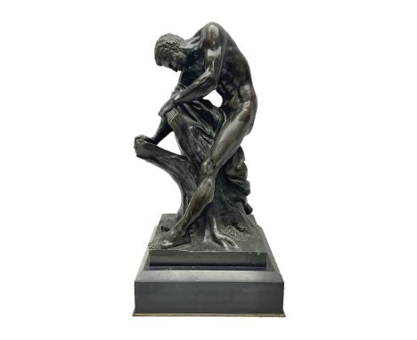 After Edme Dumont (1720-1775), bronze, Milo da Crotone splitting a tree trunk with his bare hands, upon square black marble p