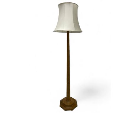 Mouseman - oak standard lamp, octagonal tapered stem on stepped and moulded octagonal base, carved with mouse signature, by t