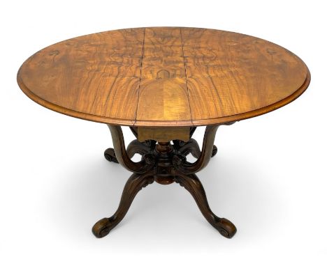 Unusual Victorian figured walnut drop-leaf Sutherland table, moulded drop-leaf oval top, central turned baluster column with 