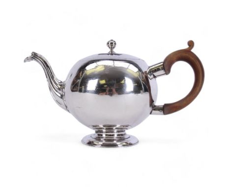 George II Scottish silver teapot, of bullet form with reeded spout and wooden scroll capped handle, upon a spreading circular
