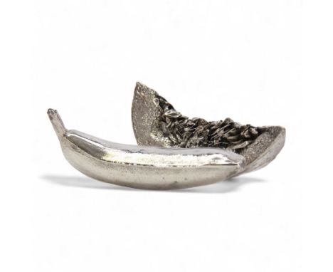 Two modern silver novelty filled models of fruit, the first example modelled as a segment of melon, L16cm, the second as a ba