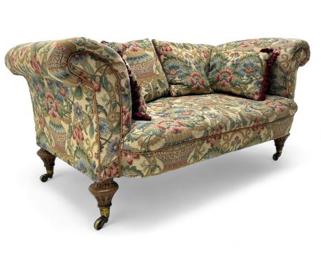 Mid-19th century walnut framed two-seat sofa, rolled arms over sprung seat, single drop-end action, raised on turned and flut