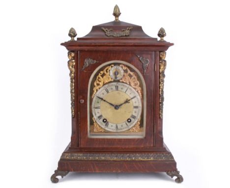 Winterhalder & Hoffmeier - Edwardian 8-day mahogany cased mantle clock, with an ogee pediment and brass pineapple finials, ar