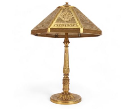 In the manner of Tiffany & Co, early 20th century gilt bronze Adam pattern table lamp, circa 1910, the circular spreading bas