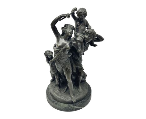 Bronze figure group, modelled as two classical figures, the male with infant upon shoulders holding flute aloft, and infant s