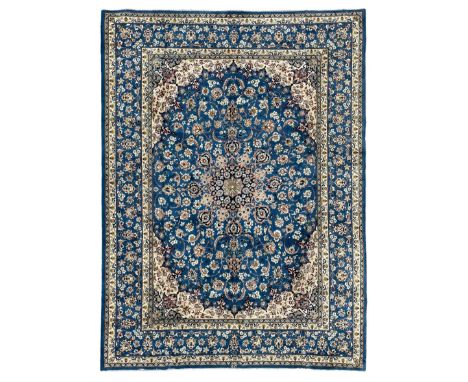 Persian Nain blue ground carpet, overall arabesque design, centre rosette medallion with eight projecting palmettes, the surr