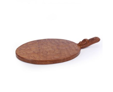 Mouseman - tooled oak cheeseboard, oval form with projecting handle carved with mouse signature, by the workshop of Robert Th