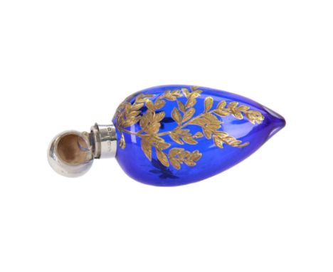 Victorian silver mounted scent bottle, the blue glass body of teardrop form painted in gilt with trailing leaves and insect, 