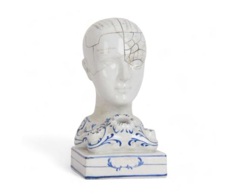 19th century Staffordshire pottery Phrenology head inkwell, circa 1860, the head mapped out, upon a scrolling base with pen/i