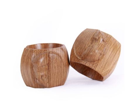 Mouseman - two oak napkin rings, bulbous octagonal form carved with mouse signature, by the workshop of Robert Thompson, Kilb