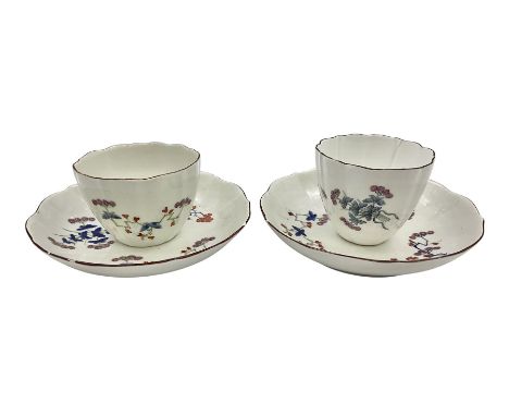 Two 18th century Meissen teabowls and saucers, circa 1740, each of faceted form, painted in the Kakiemon style with blossomin