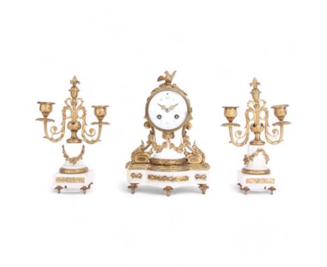 French Louis XVI style white marble and gilt 8-day mantle clock with conforming two-light candelabra c1900,  drum cased movem