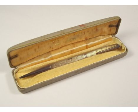 PENCIL. A modern silver gilt Yard-O-Led propelling pencil, with case.