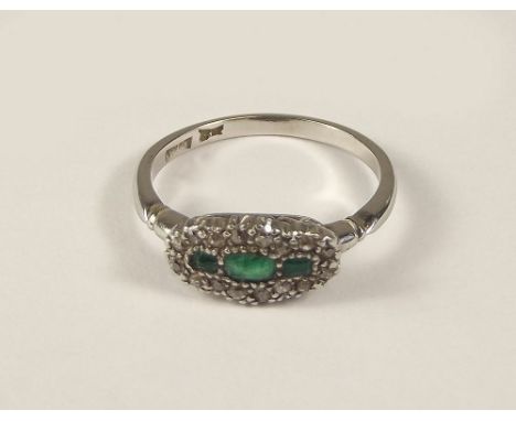 EMERALD &amp; DIAMOND RING. An emerald &amp; diamond ring. Size L.