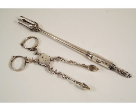 SUGAR NIPS ETC. A pair of Georgian sugar nips &amp; an EPNS pickle fork.