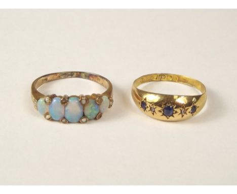 GOLD RINGS. A 9ct. gold opal ring, size N/O, &amp; an 18ct. gold late Victorian sapphire &amp; diamond ring, size N.